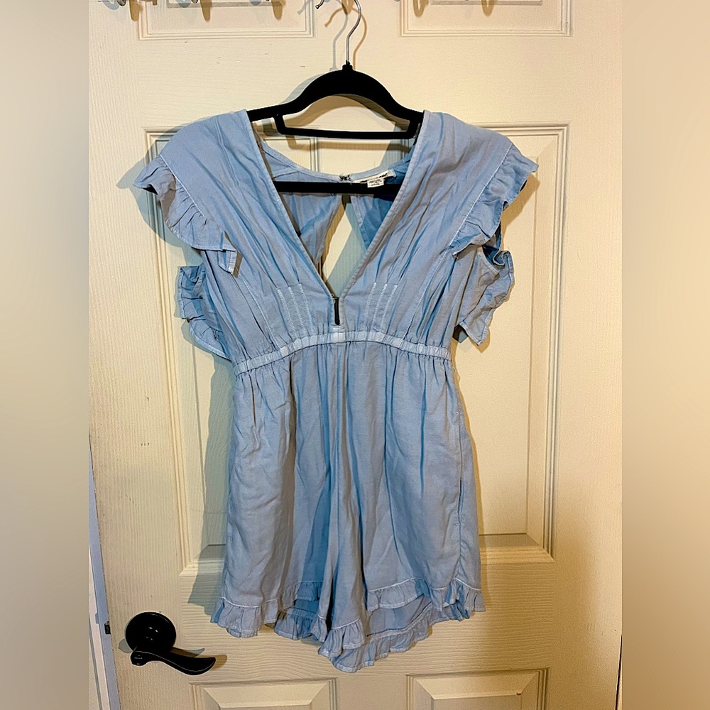 Size small billabong blue ruffled v neck romper
